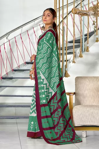 Green ikkat print mulmul cotton saree with blouse.