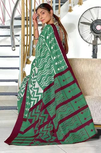 Green ikkat print mulmul cotton saree with blouse.