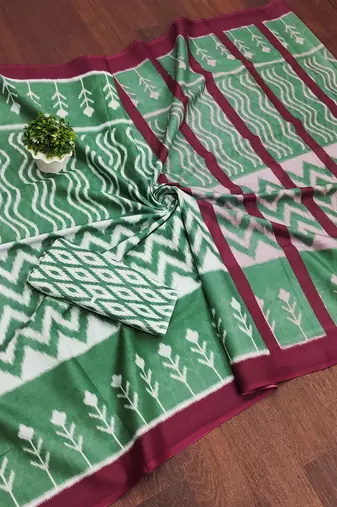 Green ikkat print mulmul cotton saree with blouse.