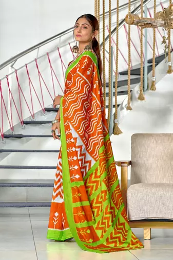 Orange ikkat print mulmul cotton saree with blouse.