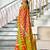 Orange ikkat print mulmul cotton saree with blouse.
