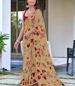 Beige floral print mulmul cotton saree with blouse.