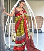 Green ikkat print mulmul cotton saree with blouse.