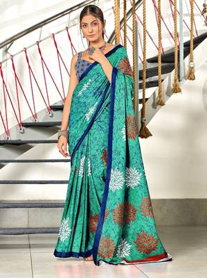 Aqua blue floral, block print mulmul cotton saree with blouse. 1