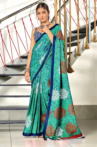 Aqua blue floral, block print mulmul cotton saree with blouse.