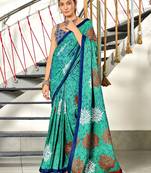 Aqua blue floral, block print mulmul cotton saree with blouse.