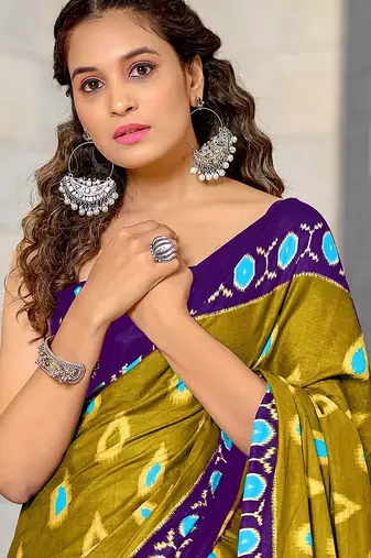 Green ikkat print mulmul cotton saree with blouse.