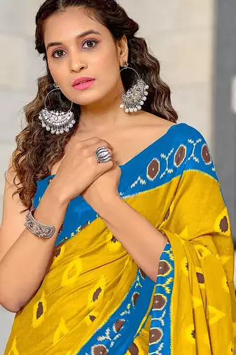 Yellow ikkat print mulmul cotton saree with blouse.
