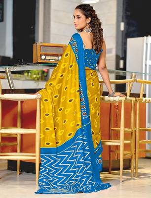 Yellow ikkat print mulmul cotton saree with blouse. 4