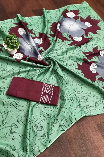 Light green floral print mulmul cotton saree with blouse.