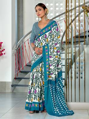 Blue ikkat print mulmul cotton saree with blouse. 1