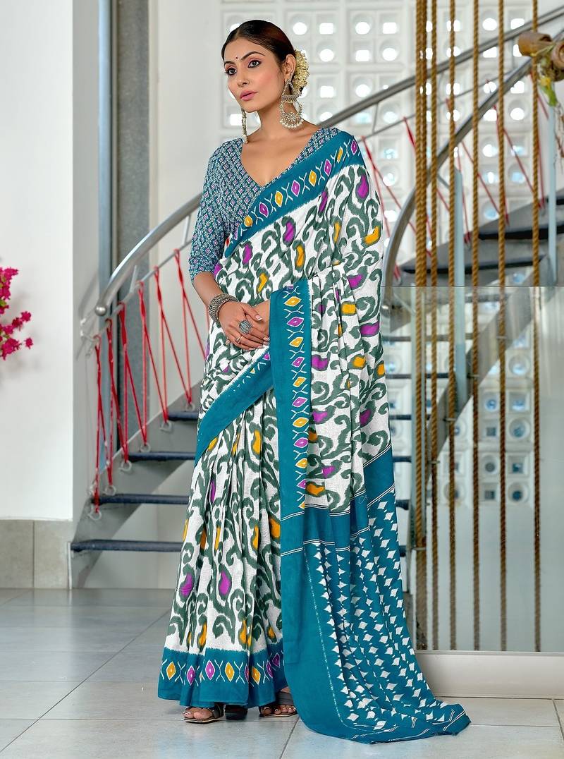 Blue ikkat print mulmul cotton saree with blouse.