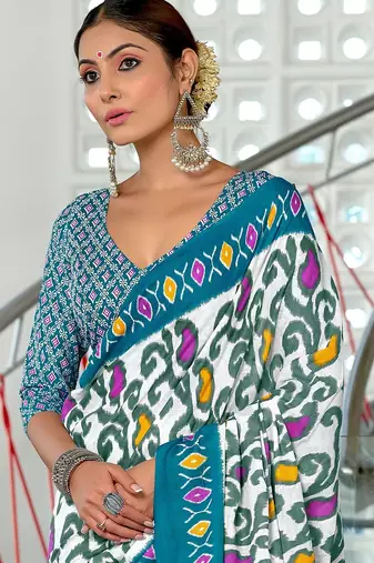 Blue ikkat print mulmul cotton saree with blouse.