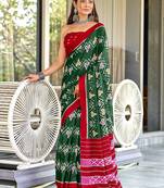 Green ikkat print mulmul cotton saree with blouse.