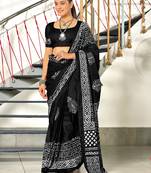 Black batik print mulmul cotton saree with blouse.