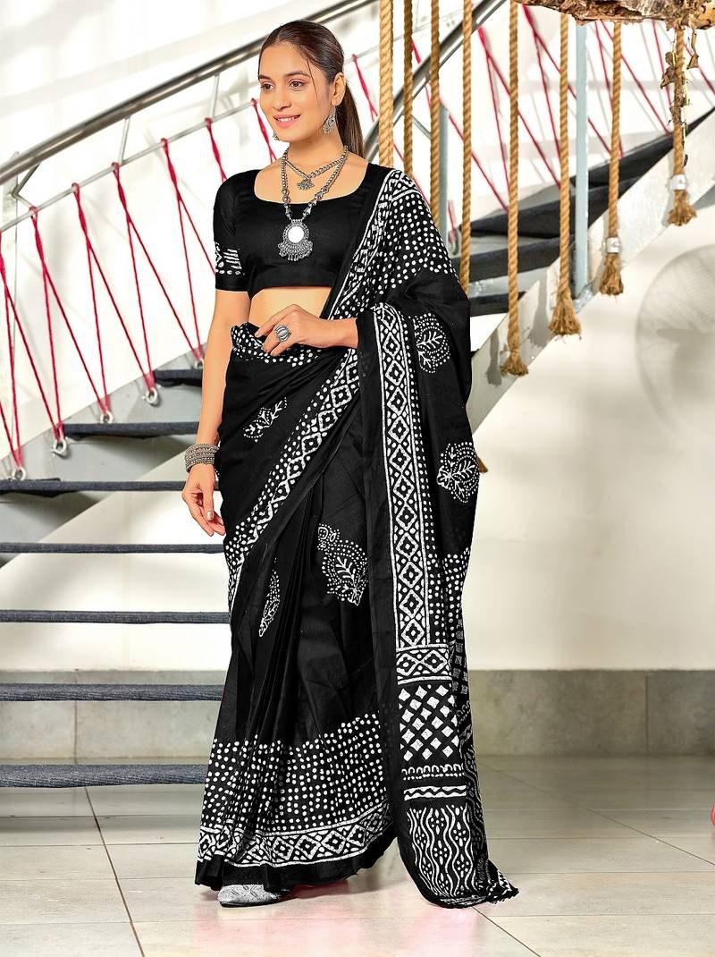 Black batik print mulmul cotton saree with blouse.
