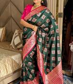 Dark green silk blend banarasi woven saree with unstitched blouse piece
