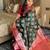 Dark green silk banarasi woven saree with unstitched blouse piece