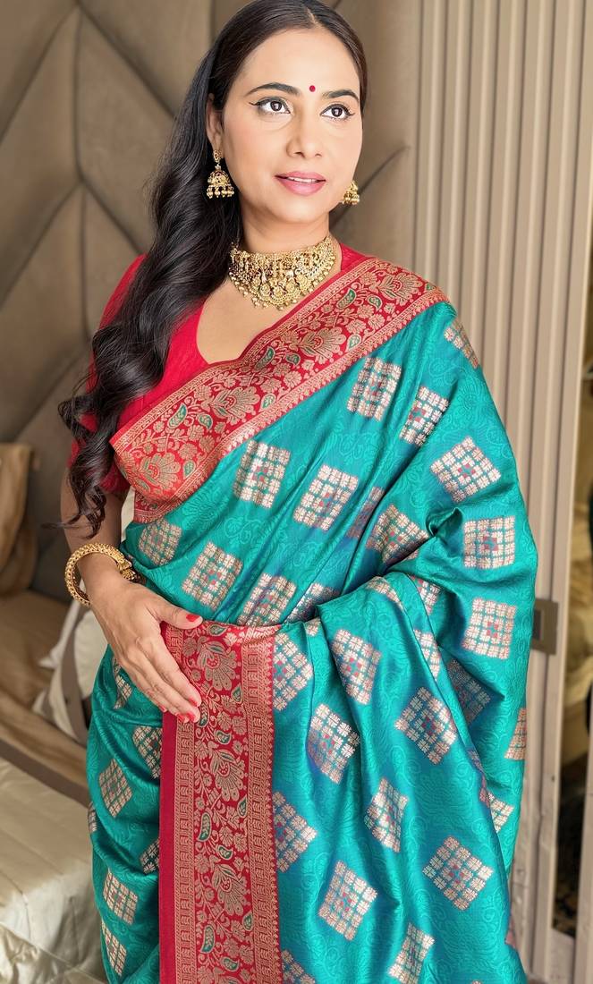 Turquoise silk banarasi woven saree with unstitched blouse piece