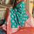 Turquoise silk banarasi woven saree with unstitched blouse piece