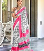 White paisley print mulmul cotton saree with blouse.