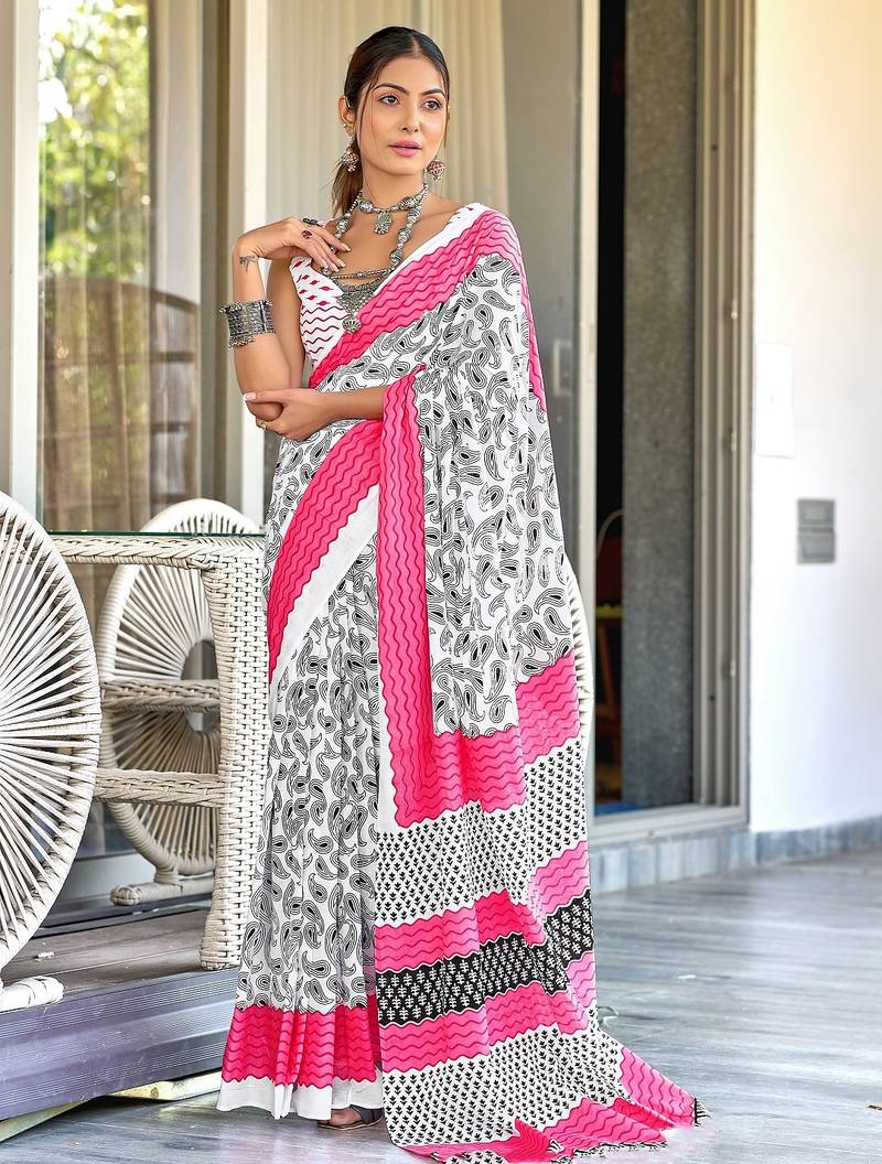 White paisley print mulmul cotton saree with blouse.