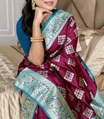 Wine silk blend banarasi woven saree with unstitched blouse piece