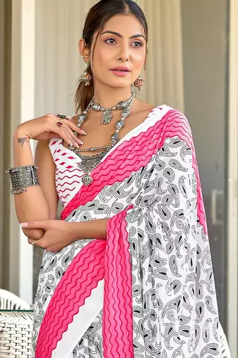 White paisley print mulmul cotton saree with blouse.