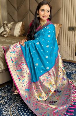 Blue silk blend paithani saree with unstitched blouse piece 1