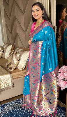 Blue silk blend paithani saree with unstitched blouse piece 2