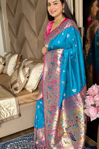Blue silk blend paithani saree with unstitched blouse piece