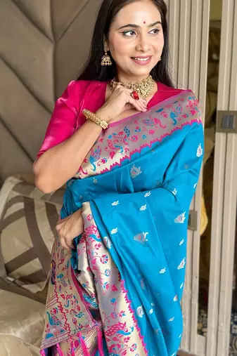 Blue silk blend paithani saree with unstitched blouse piece
