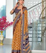 Orange floral print pure cotton mulmul saree with blouse.