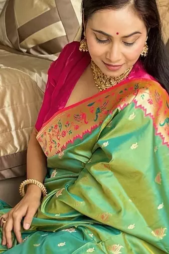 Parrot green silk blend paithani saree with unstitched blouse piece