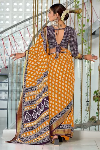 Orange floral print pure cotton mulmul saree with blouse.