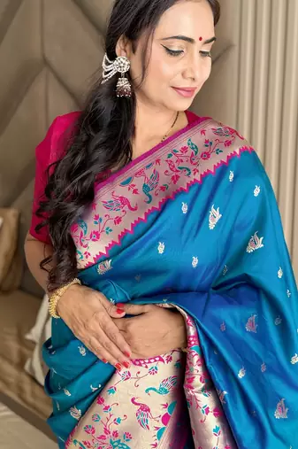 Teal silk blend paithani saree with unstitched blouse piece
