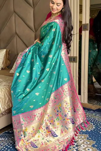 Turquoise silk blend paithani saree with unstitched blouse piece