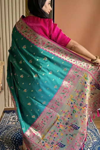 Turquoise silk blend paithani saree with unstitched blouse piece