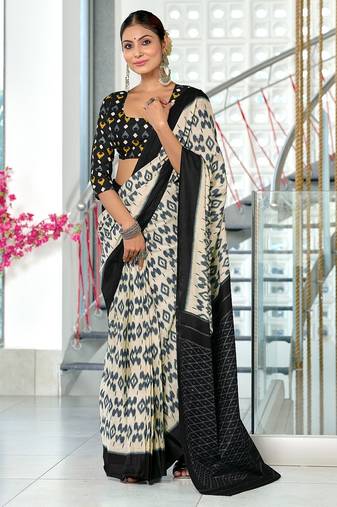 Black block print mulmul cotton saree with blouse.