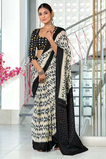 Black block print mulmul cotton saree with blouse.