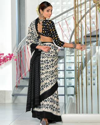 Black block print mulmul cotton saree with blouse. 4