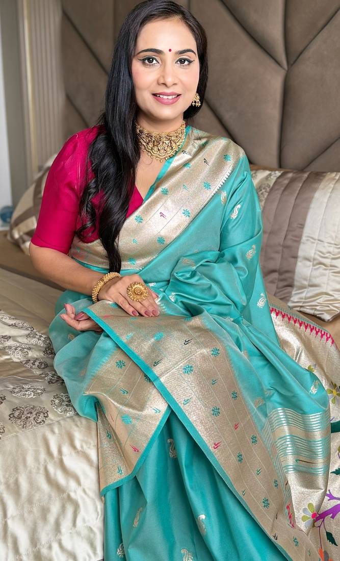 Turquoise silk paithani saree with unstitched blouse piece