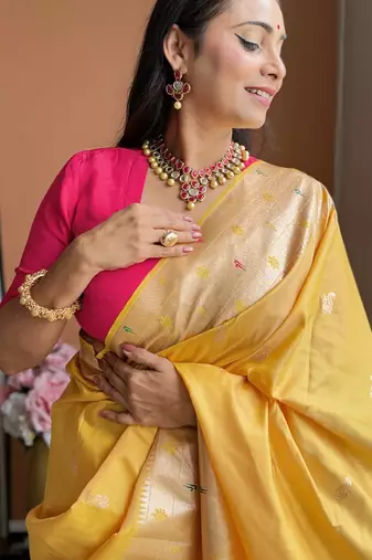 Yellow silk paithani saree with unstitched blouse piece
