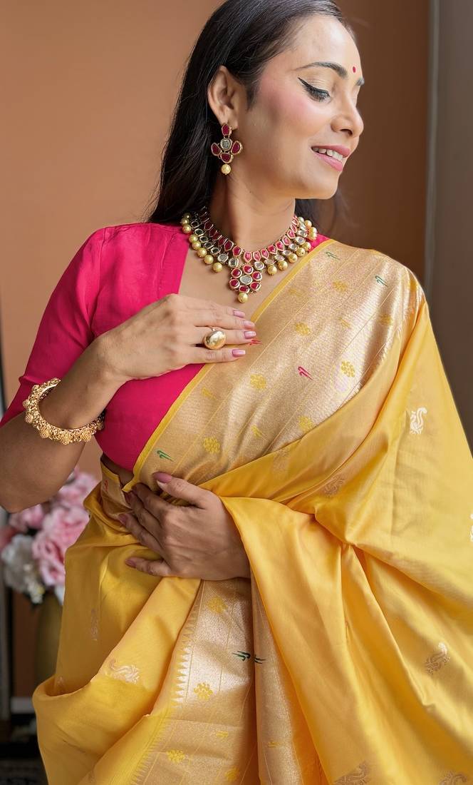 Yellow silk paithani saree with unstitched blouse piece