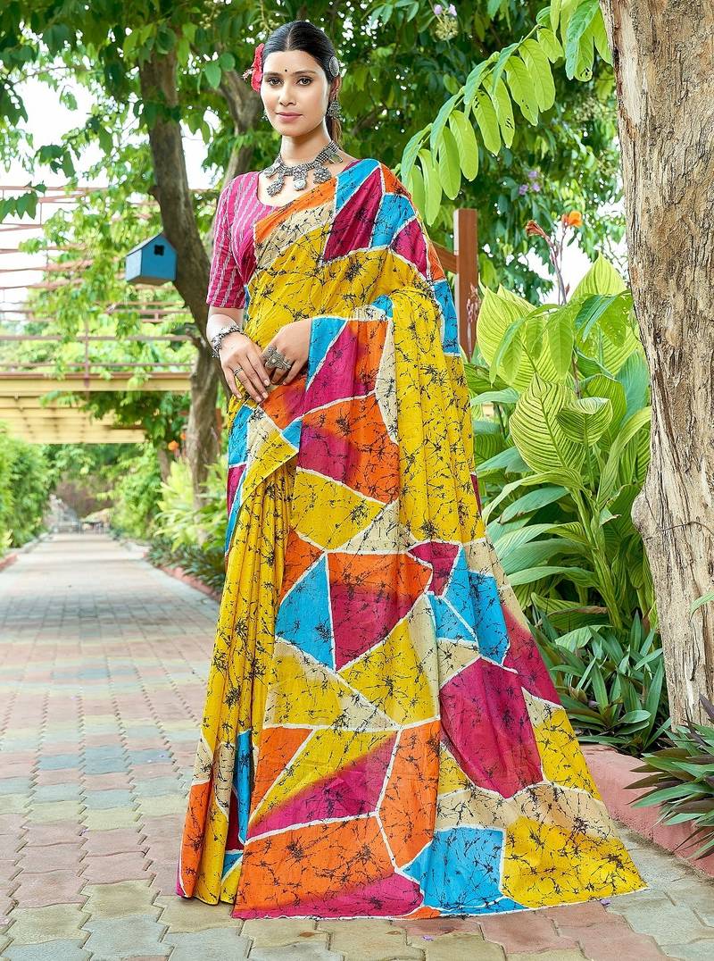 Yellow printed mulmul cotton saree with blouse.
