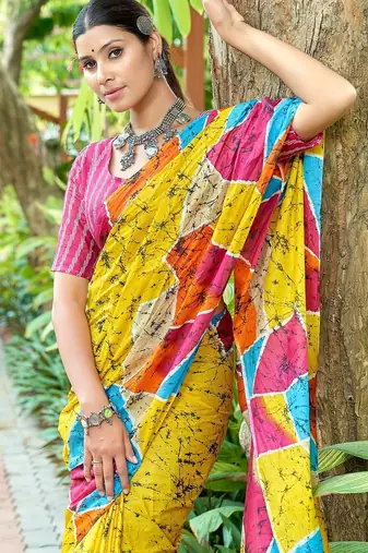 Yellow printed mulmul cotton saree with blouse.
