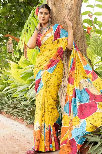 Yellow printed mulmul cotton saree with blouse.