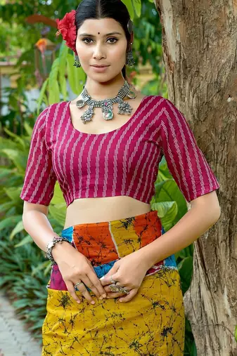 Yellow printed mulmul cotton saree with blouse.
