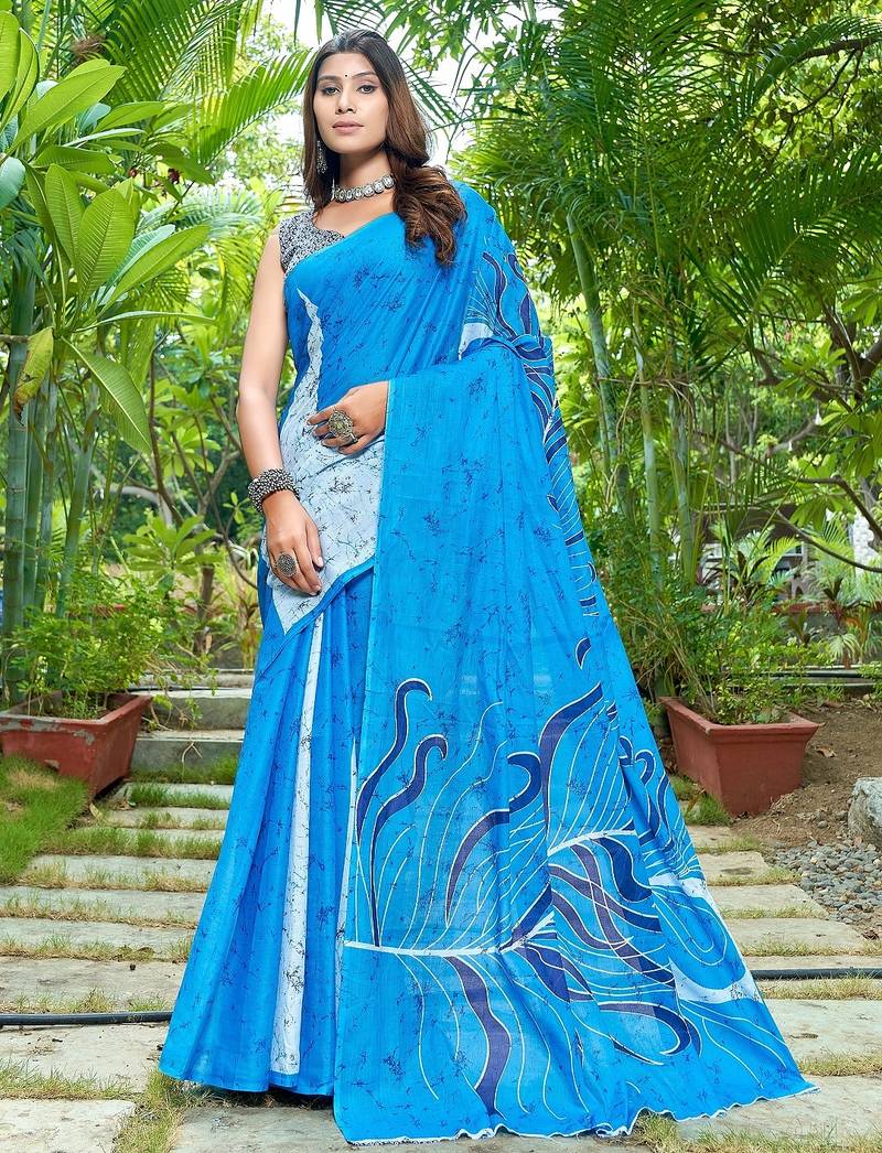 Blue printed mulmul cotton saree with blouse.