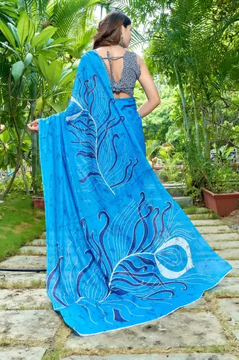 Blue printed mulmul cotton saree with blouse.